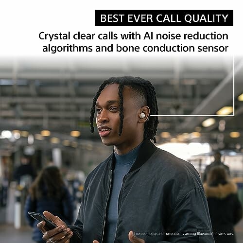 Person using earbuds with AI noise reduction and bone conduction sensor.