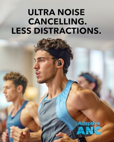 Man exercising with noise cancelling earbuds.