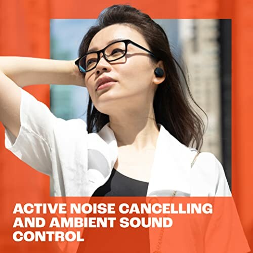 Woman wearing earbuds with active noise cancelling and ambient sound control.